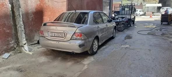 صورة من إعلان: ميتسوبيشي لانسر ٢٠٠٦ (1)